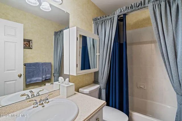 a aerial view of a house with a yard