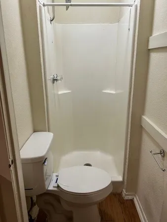 a bathroom with a toilet and a sink