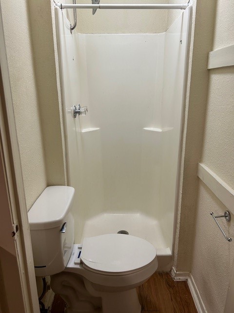 4709 Harmon Avenue, Unit 322 Austin, TX 78751 - Photo 5 of 8 a bathroom with a toilet and a sink