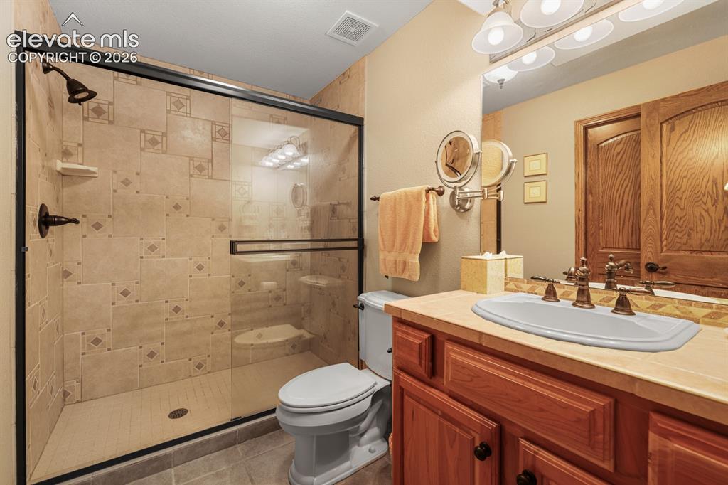 17990 Sawmill Road Colorado Springs, CO 80908 - Photo 32 of 40 One of two full bathrooms on the lower level
