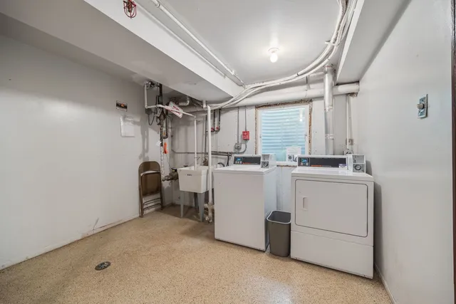 a utility room with dryer and washer