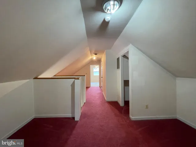 a view of a hallway with entryway