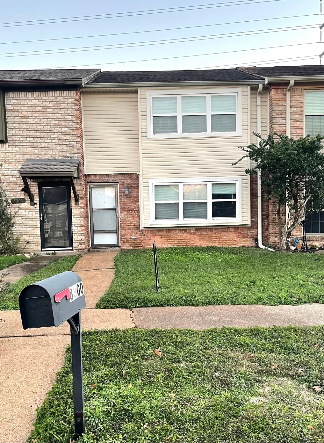 8300 Oakhaven Road La Porte, TX 77571 - Photo 1 of 14 a front view of a house with a yard and garage