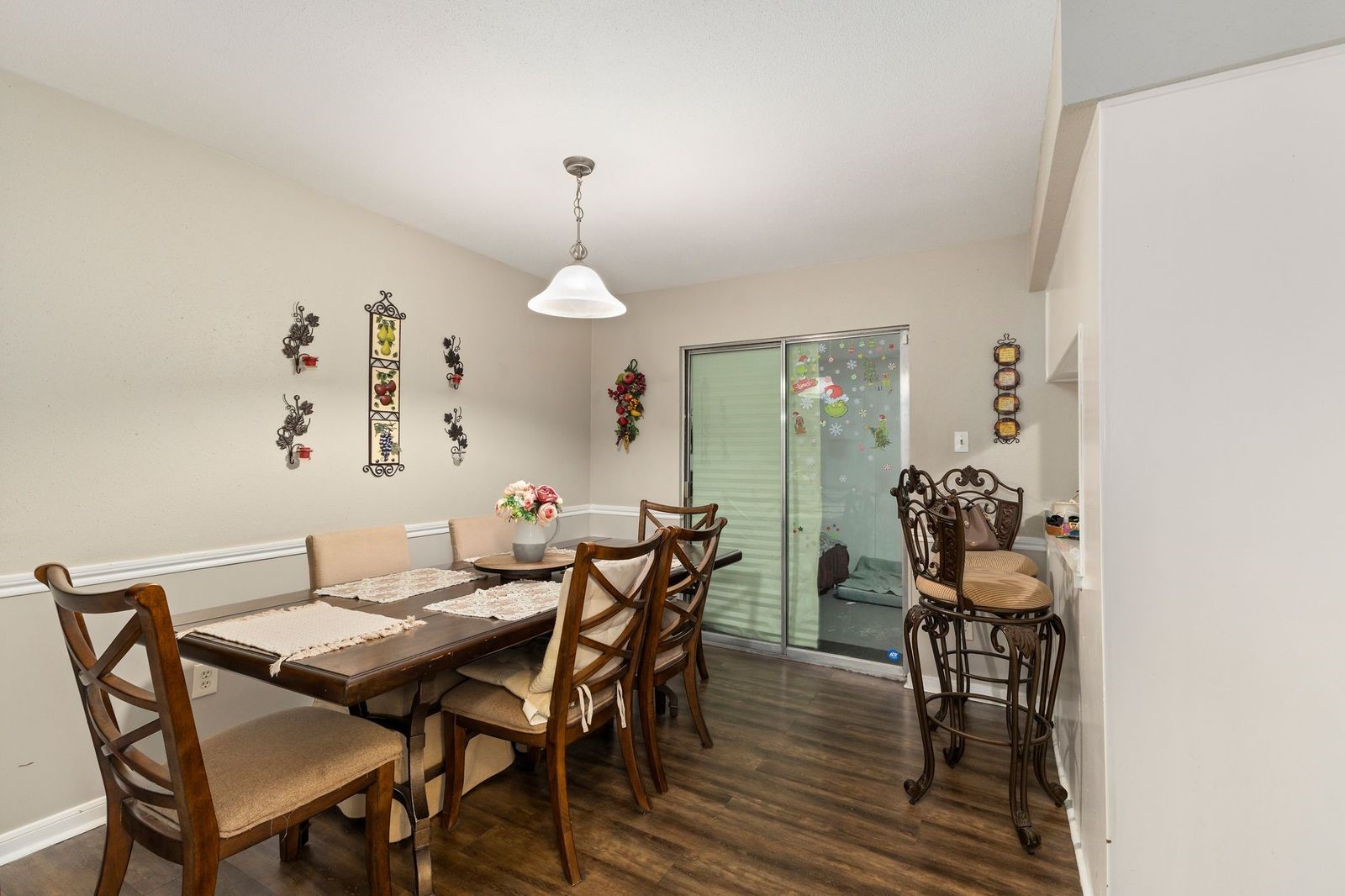 8300 Oakhaven Road La Porte, TX 77571 - Photo 4 of 14 a view of a dining room with furniture and wooden floor