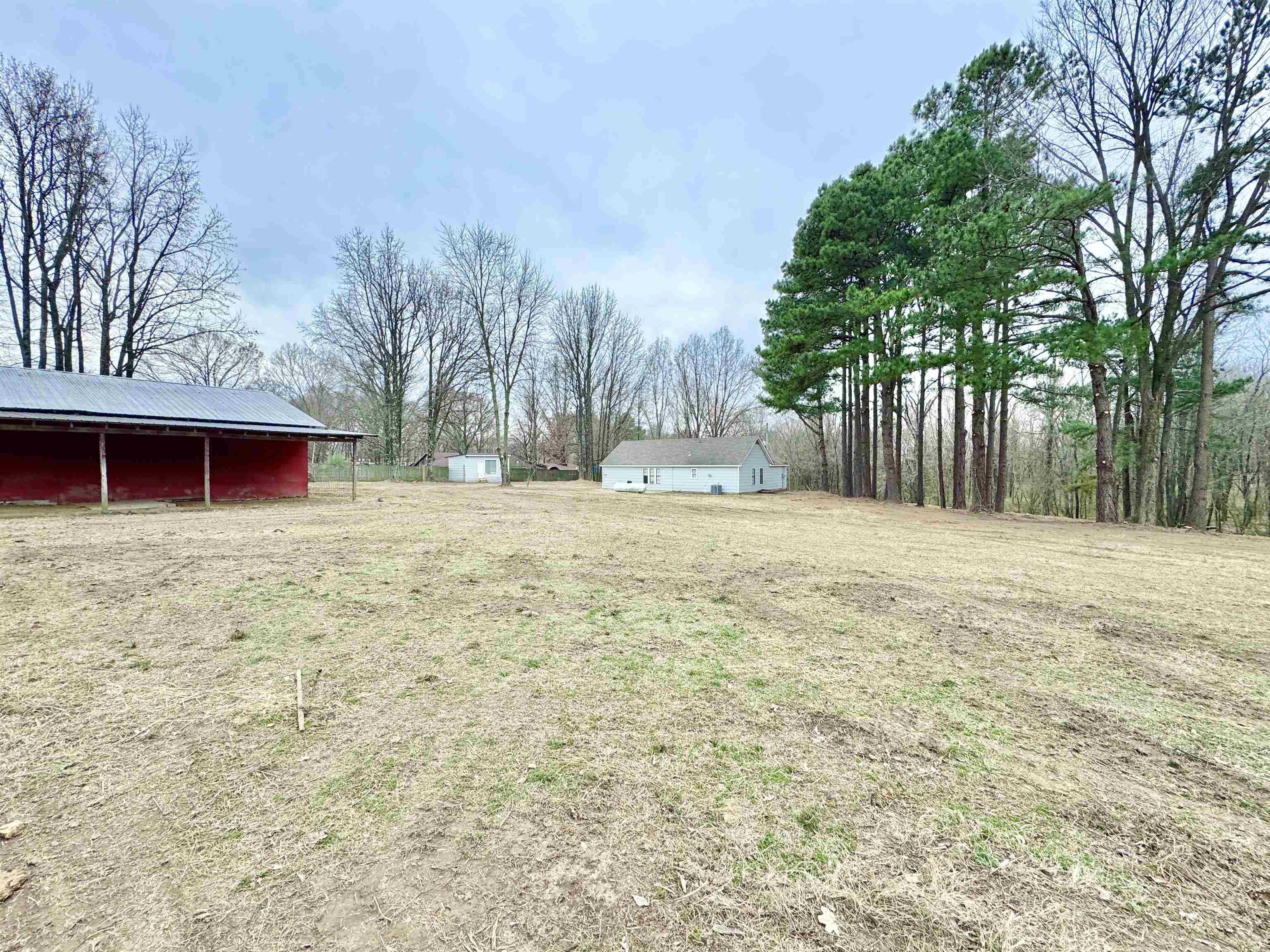 6400 Kerrville Rosemark Road Millington, TN 38053 - Photo 29 of 36 View of grassy yard featuring an outbuilding
