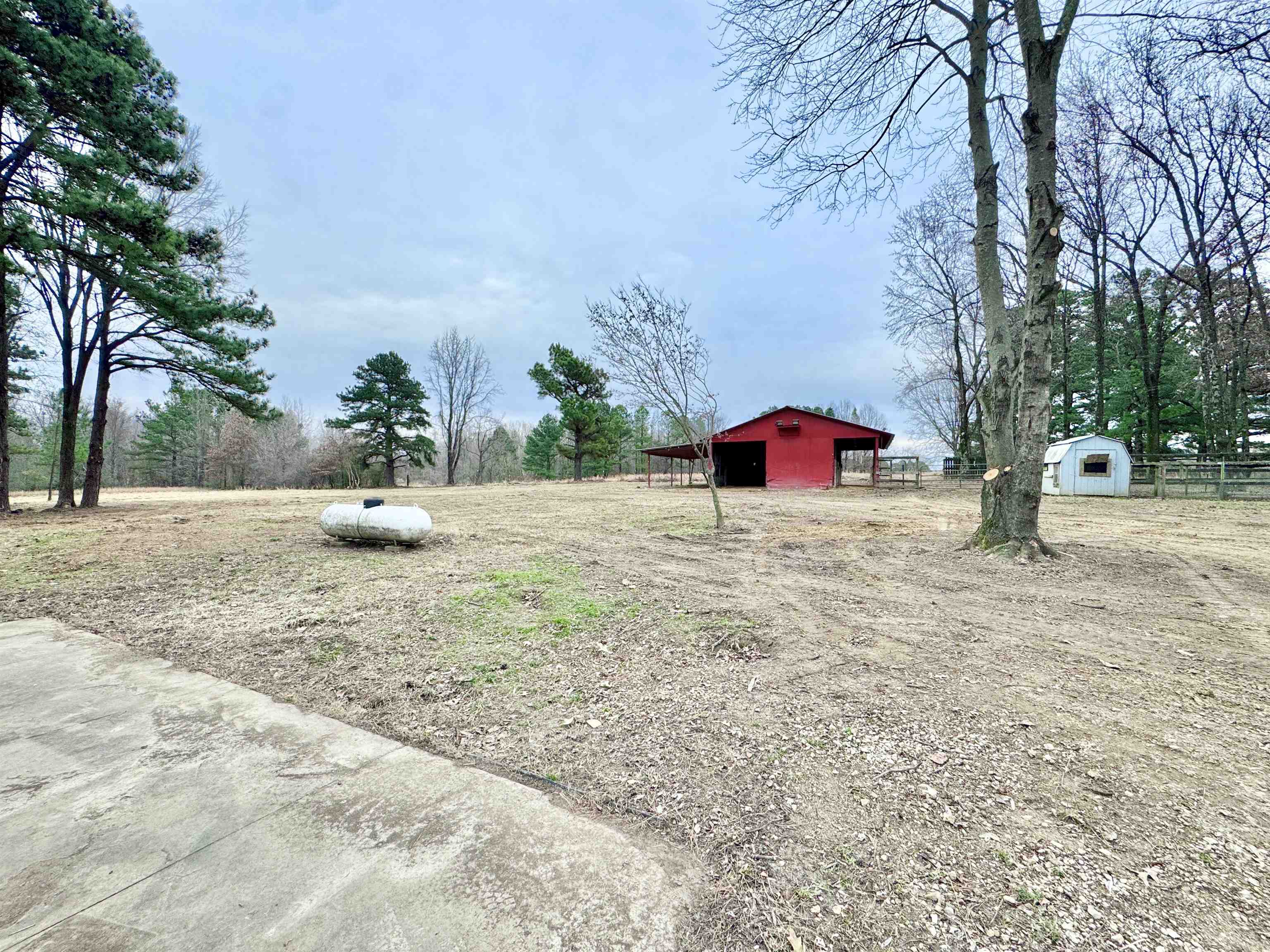 6400 Kerrville Rosemark Road Millington, TN 38053 - Photo 3 of 36 View of yard featuring an outbuilding and a pole building
