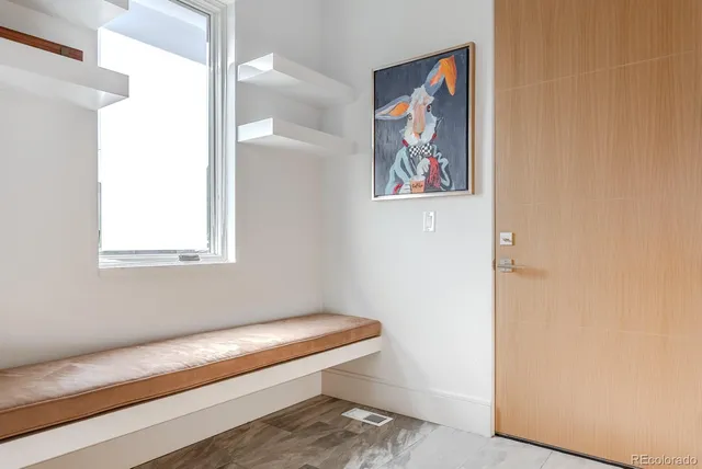 a hallway with a couch