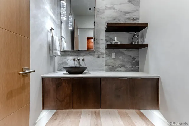 a kitchen with a sink and cabinets