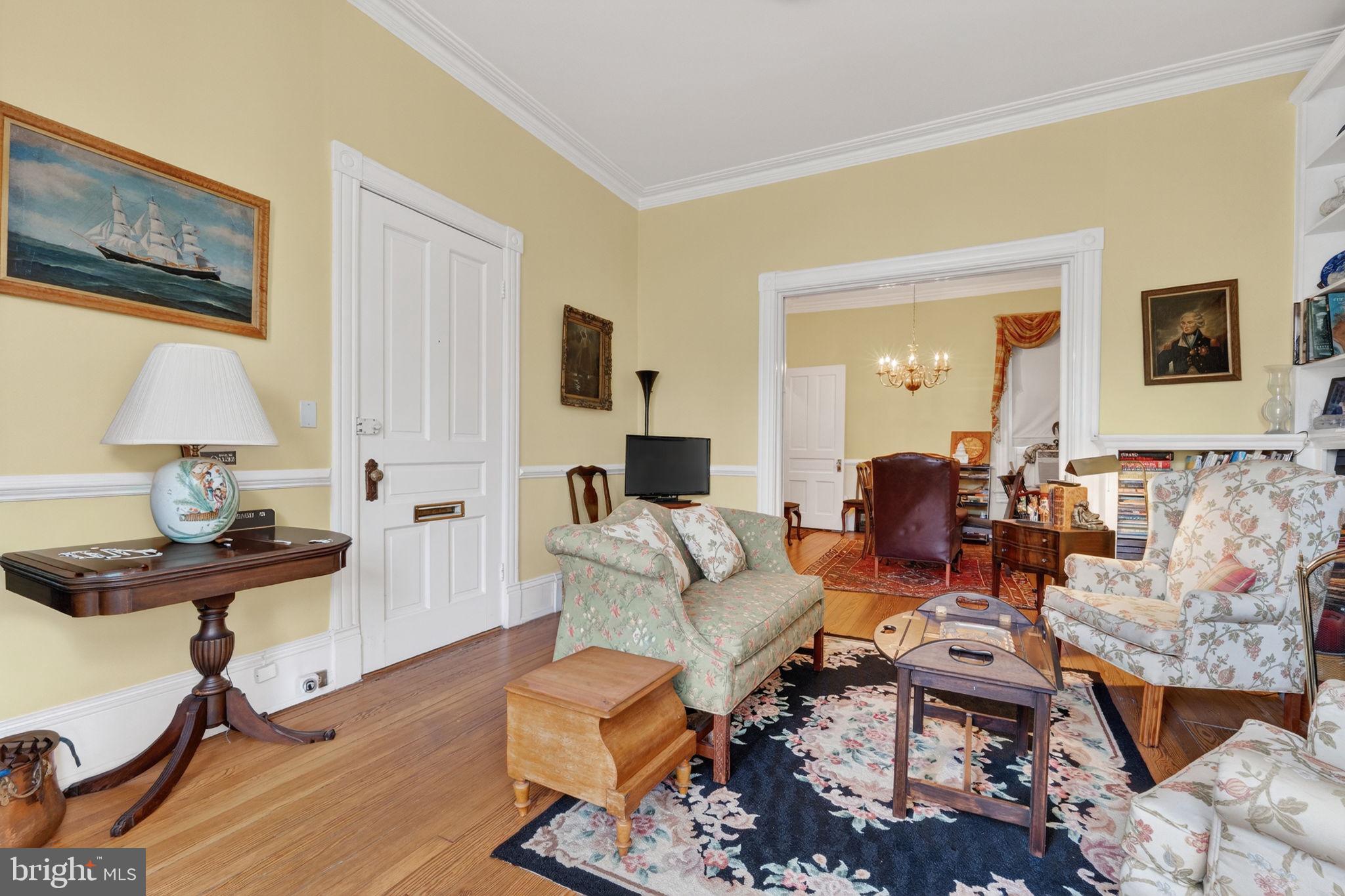 15 3rd Street Northeast, Unit 2 Washington, DC 20002 - Photo 12 of 32 a living room with furniture and a wooden floor