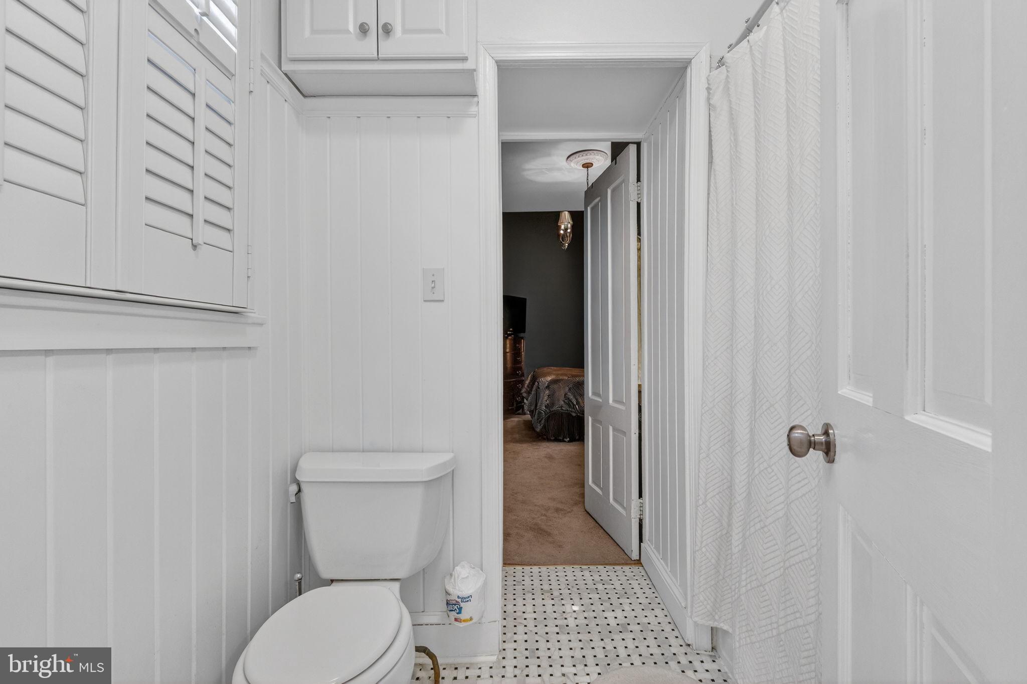 15 3rd Street Northeast, Unit 2 Washington, DC 20002 - Photo 26 of 32 a bathroom with a toilet and a shower