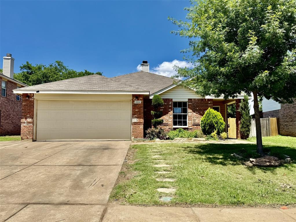 1144 Switchgrass Lane Crowley, TX 76036 - Photo 1 of 17 a view of a house with backyard