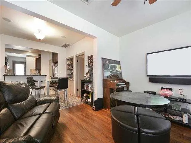 a bathroom with a toilet a sink and shower