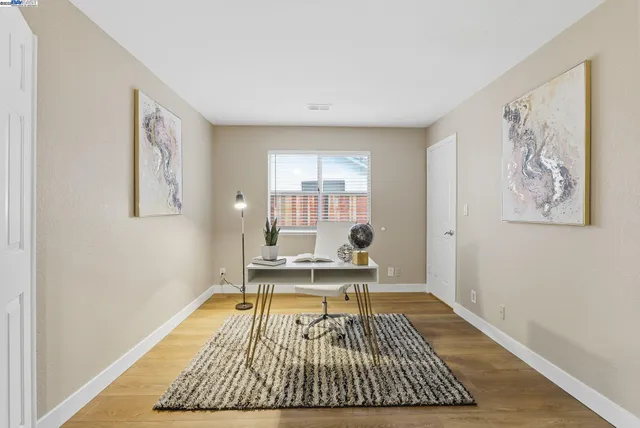 a living room with a couch and a table