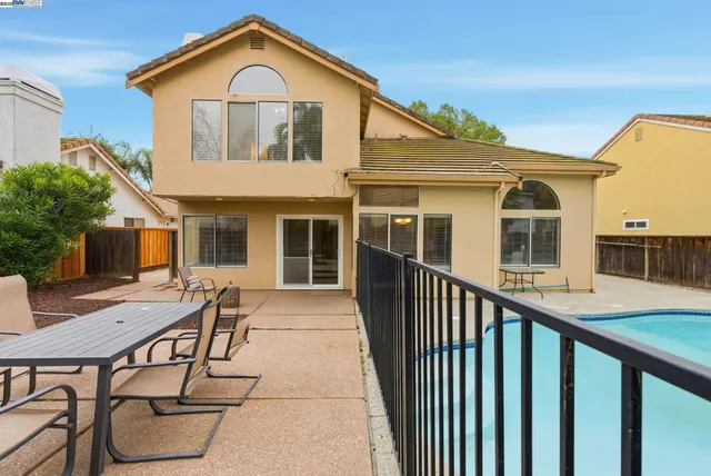 a front view of a house with patio