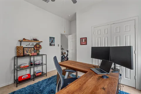 a view of a workspace with furniture