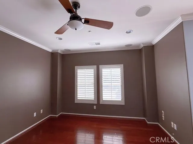 wooden floor and windows in a room
