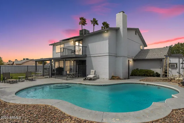 a view of a house with outdoor kitchen