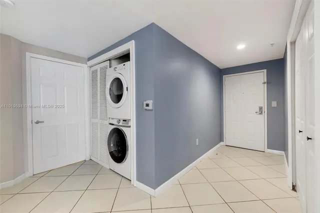 a view of a storage & utility room with washer and dryer