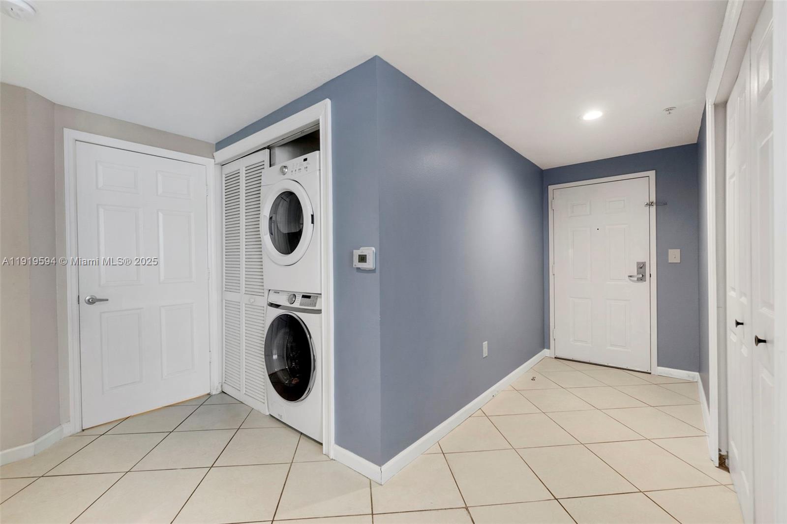 1155 Brickell Bay Drive, Unit 202 Miami, FL 33131 - Photo 19 of 46 a view of a storage & utility room with washer and dryer