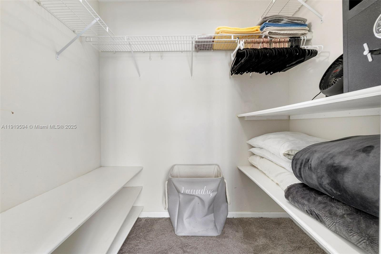 1155 Brickell Bay Drive, Unit 202 Miami, FL 33131 - Photo 25 of 46 a utility room with dryer and washer