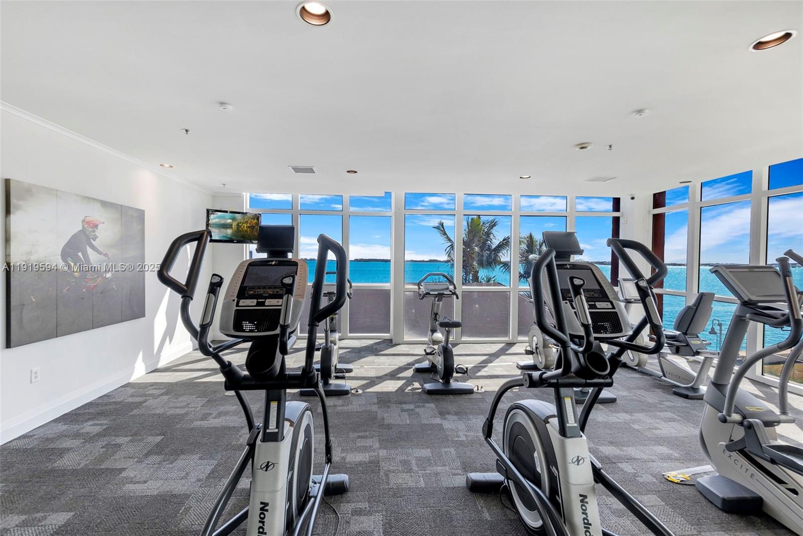 1155 Brickell Bay Drive, Unit 202 Miami, FL 33131 - Photo 37 of 46 a view of a room with gym equipment
