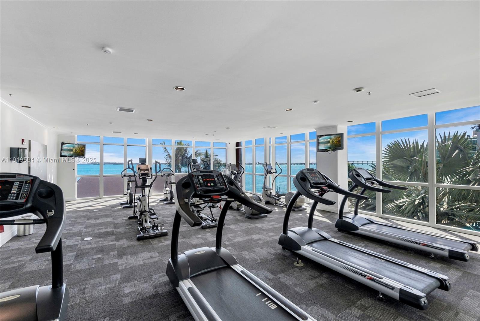 1155 Brickell Bay Drive, Unit 202 Miami, FL 33131 - Photo 38 of 46 a view of a room with gym equipment