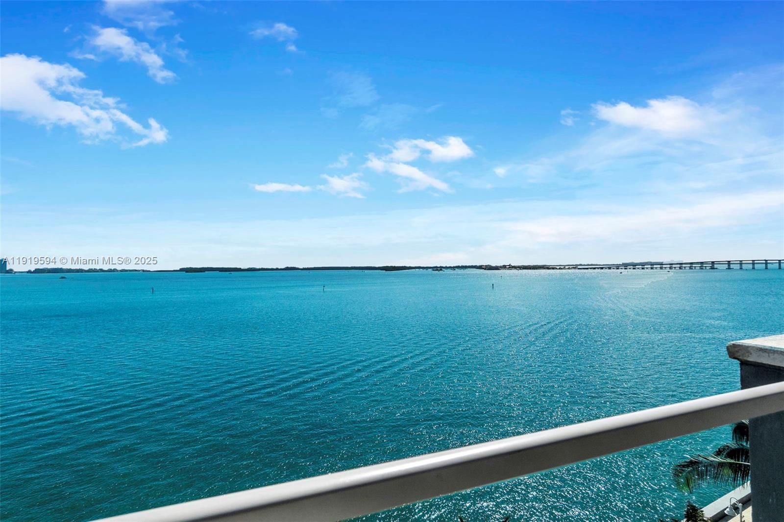 1155 Brickell Bay Drive, Unit 202 Miami, FL 33131 - Photo 46 of 46 a view of a lake from a balcony