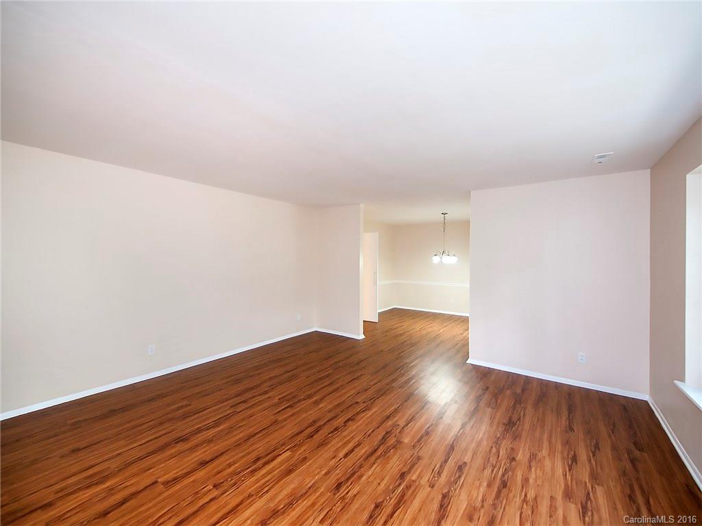 701 Neill Ridge Road Matthews, NC 28105 - Photo 3 of 21 a view of an empty room and wooden floor