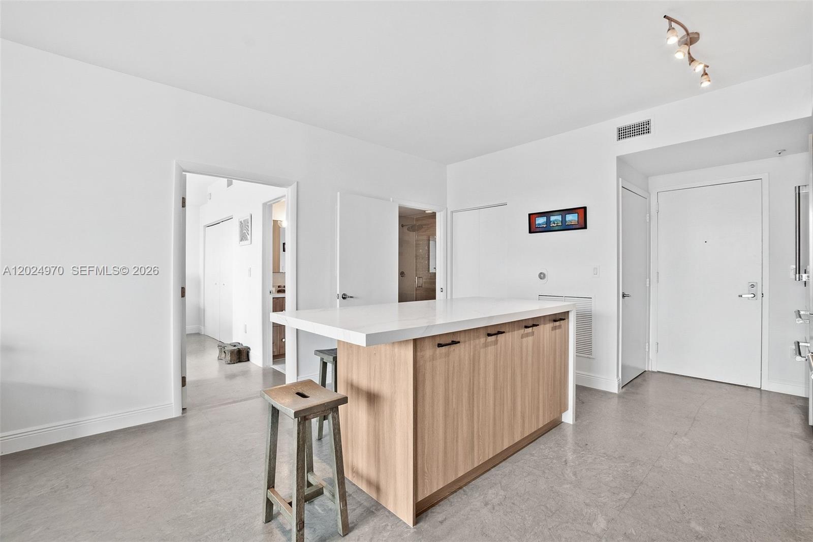 90 Southwest 3rd Street, Unit 3810 Miami, FL 33130 - Photo 18 of 45 a kitchen with cabinets a sink and appliances