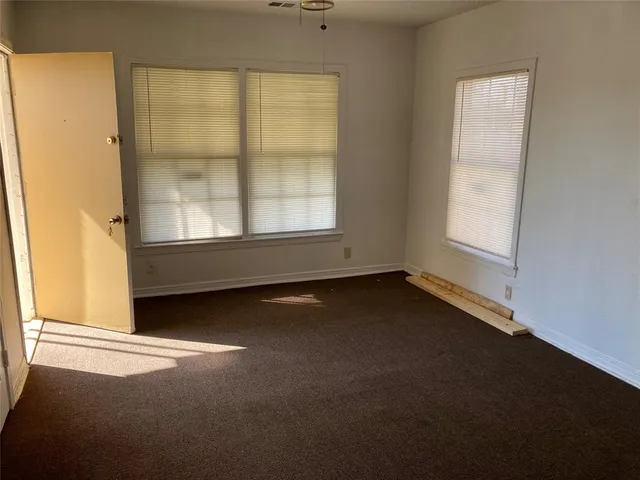 an empty room with a window