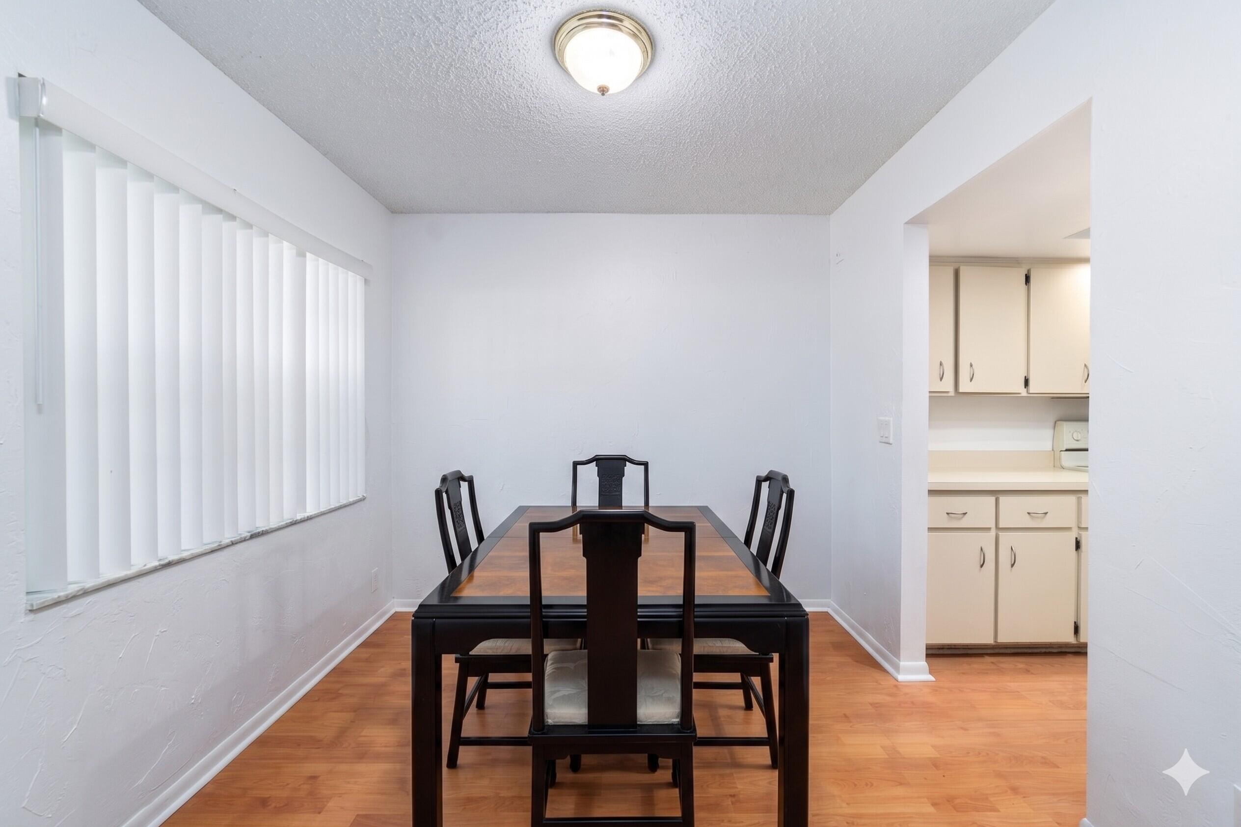 8968 West Sample Road, Unit 101 Coral Springs, FL 33065 - Photo 13 of 29 Dining room v2