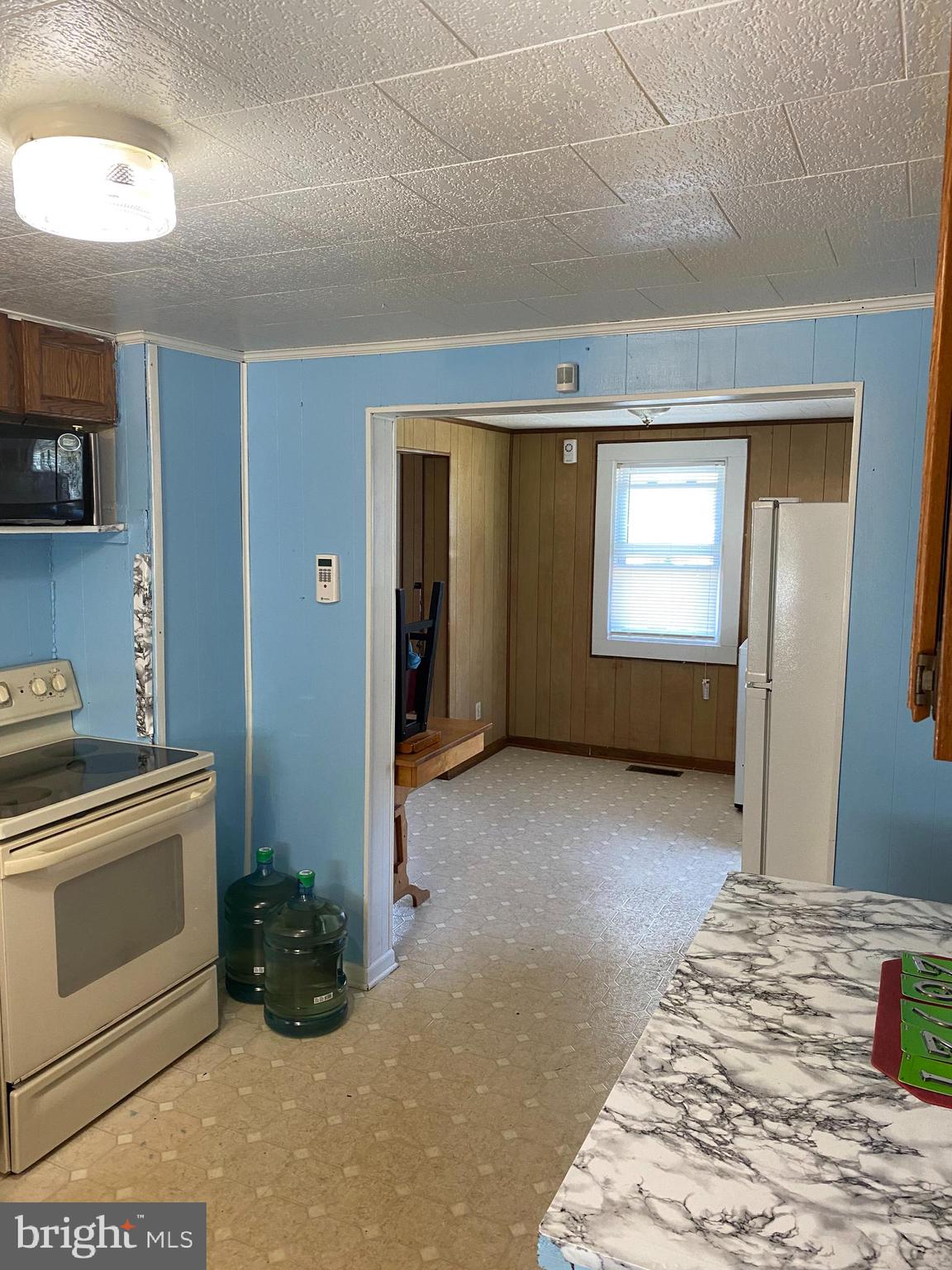28521 Deal Island Road Princess Anne, MD 21853 - Photo 5 of 14 Kitchen looking into dining area
