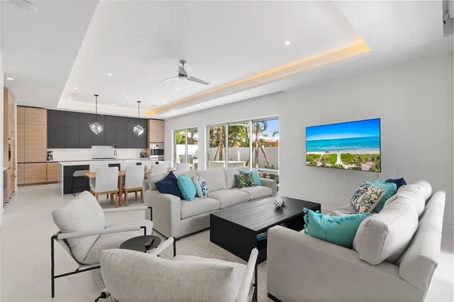 a kitchen with stainless steel appliances a stove refrigerator sink and cabinets