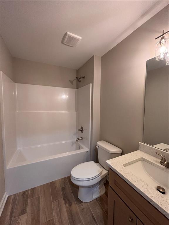 1034 Whippoorwill Road Monticello, GA 31064 - Photo 11 of 18 a bathroom with a sink a toilet and a bathtub