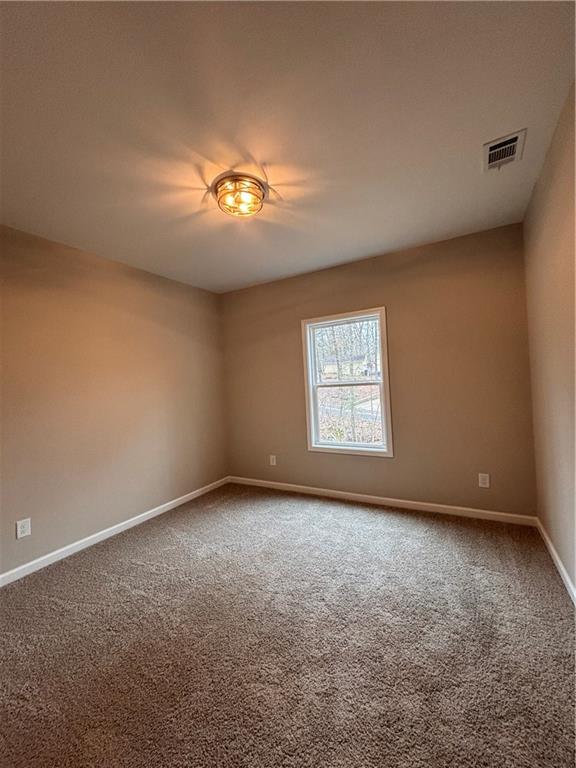 1034 Whippoorwill Road Monticello, GA 31064 - Photo 14 of 18 an empty room with a window