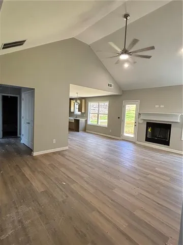 a view of livingroom and hardwood floor