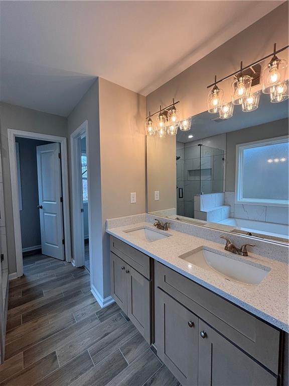 1034 Whippoorwill Road Monticello, GA 31064 - Photo 7 of 18 a bathroom with a sink double vanity and a mirror