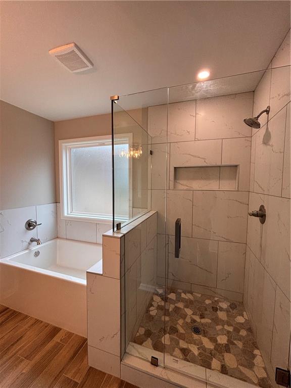 1034 Whippoorwill Road Monticello, GA 31064 - Photo 9 of 18 a bathroom with a bathtub and a shower