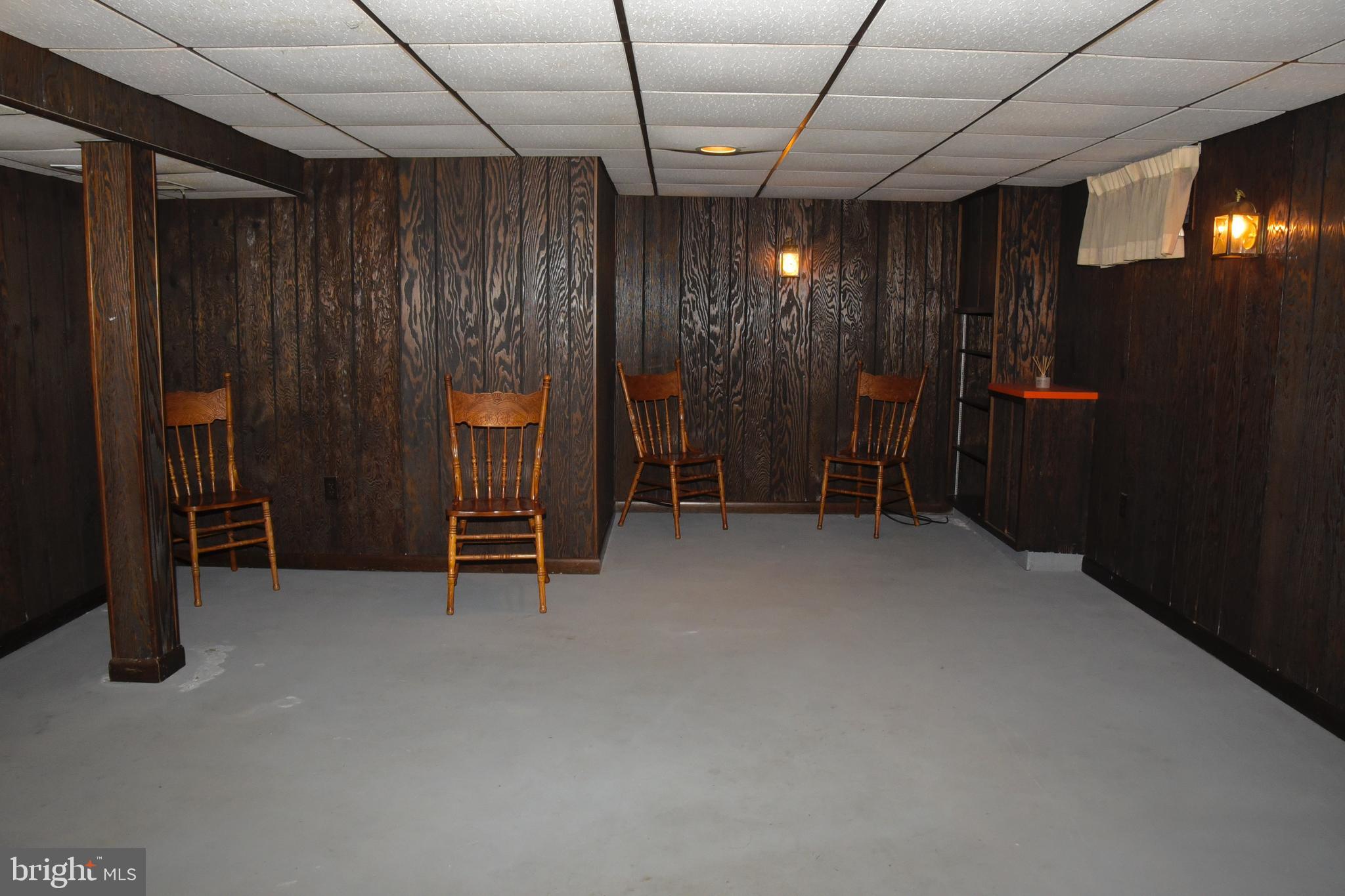 4013 5th Avenue Temple, PA 19560 - Photo 14 of 23 a view of empty room with wooden walls