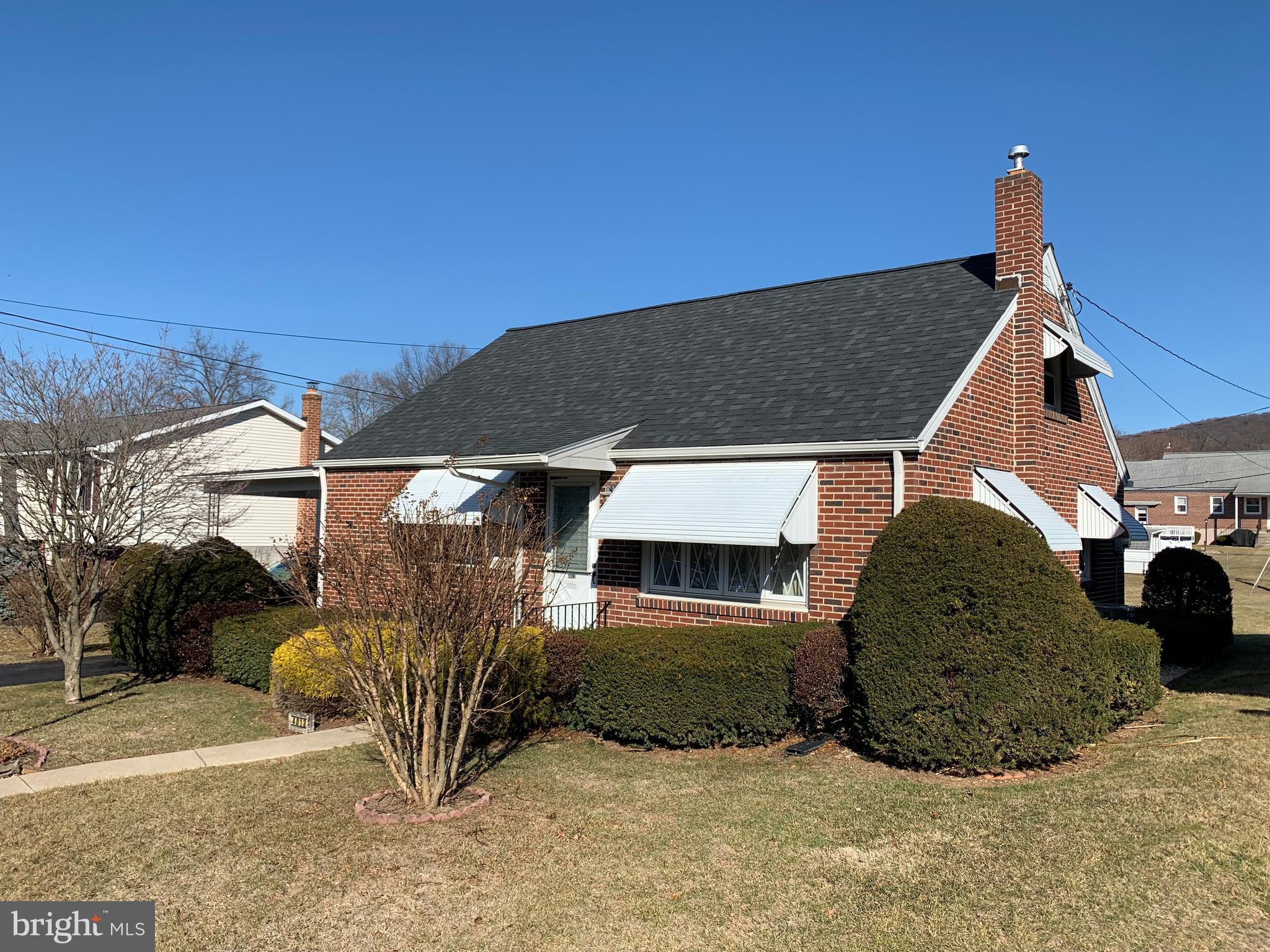 4013 5th Avenue Temple, PA 19560 - Photo 2 of 23 a view of a house with large windows