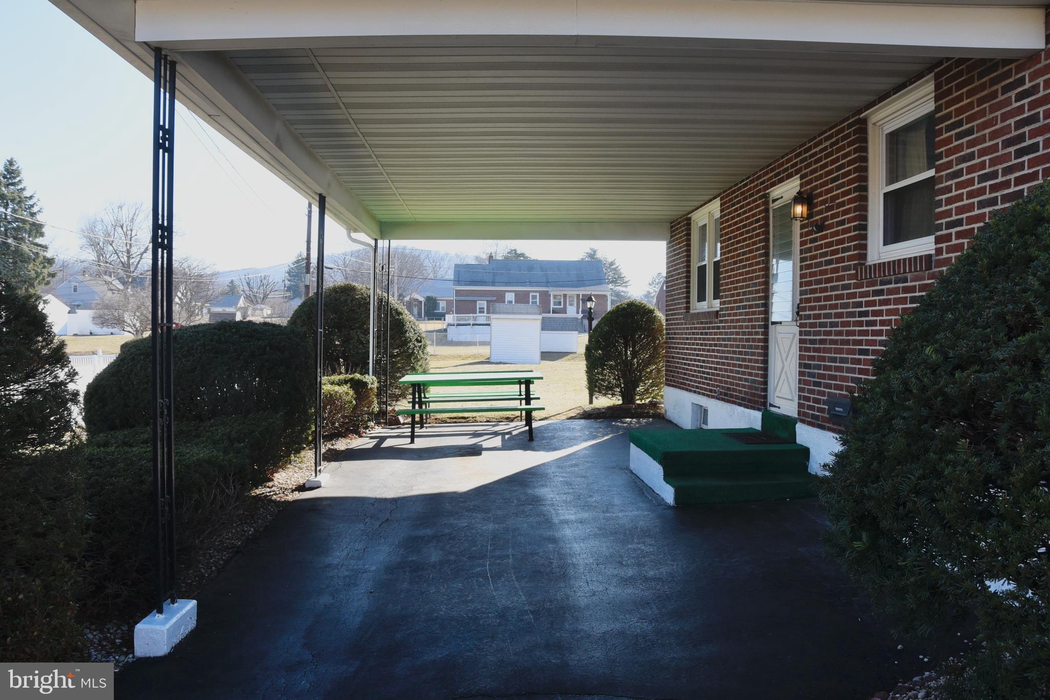 4013 5th Avenue Temple, PA 19560 - Photo 23 of 23 a view of a porch with furniture and a yard