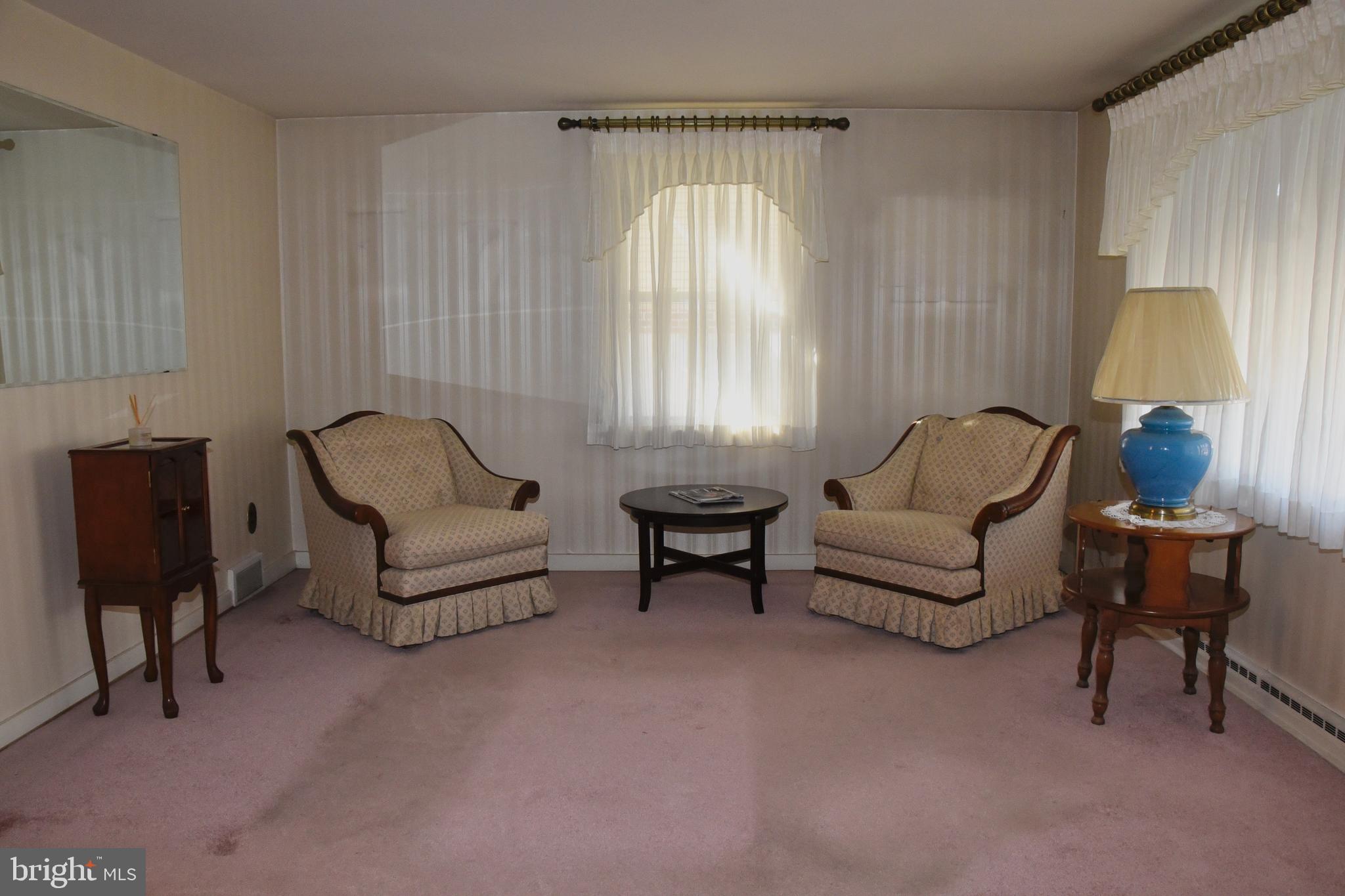 4013 5th Avenue Temple, PA 19560 - Photo 3 of 23 a living room with furniture and a window