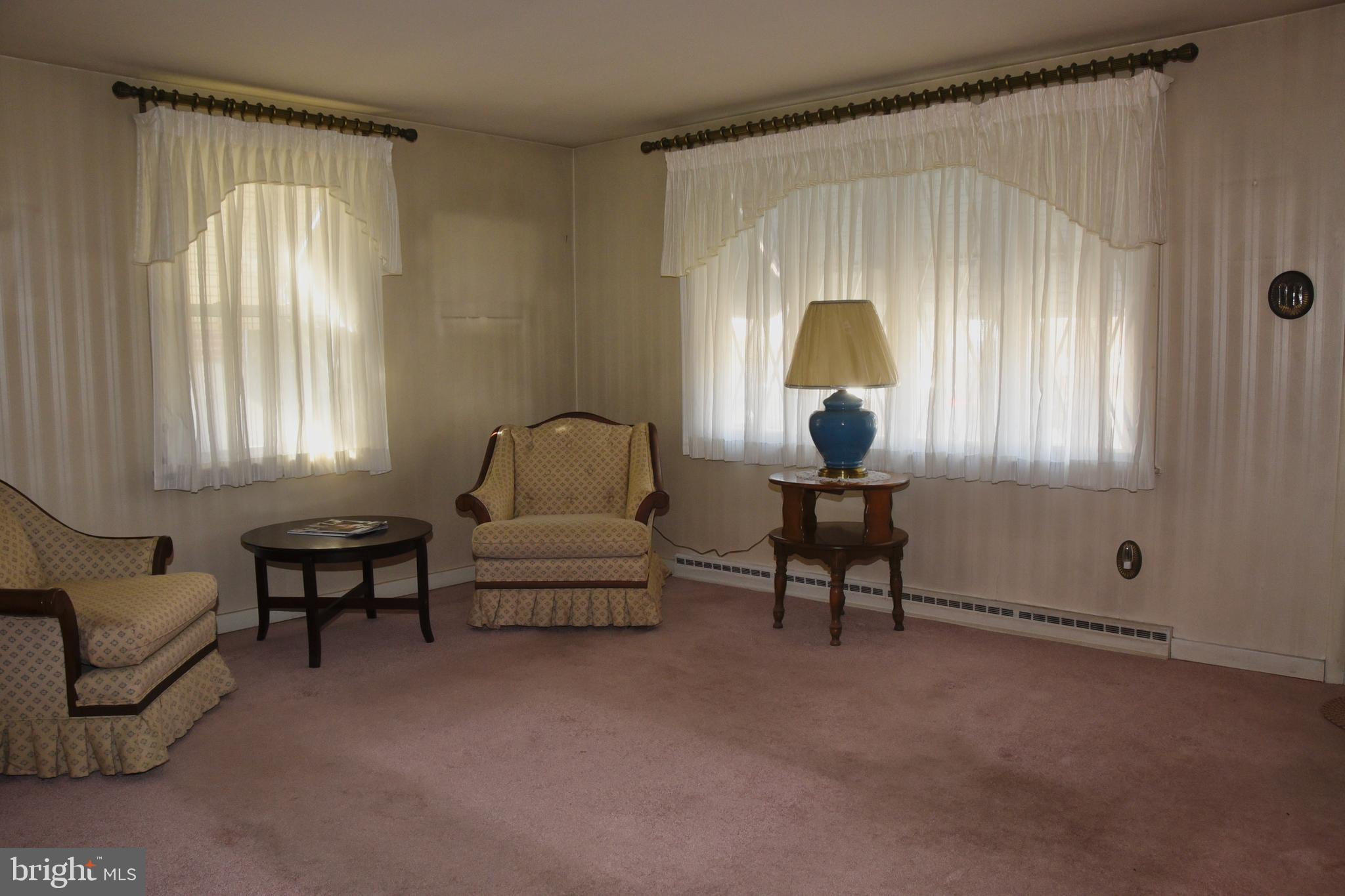 4013 5th Avenue Temple, PA 19560 - Photo 4 of 23 a living room with furniture and a window