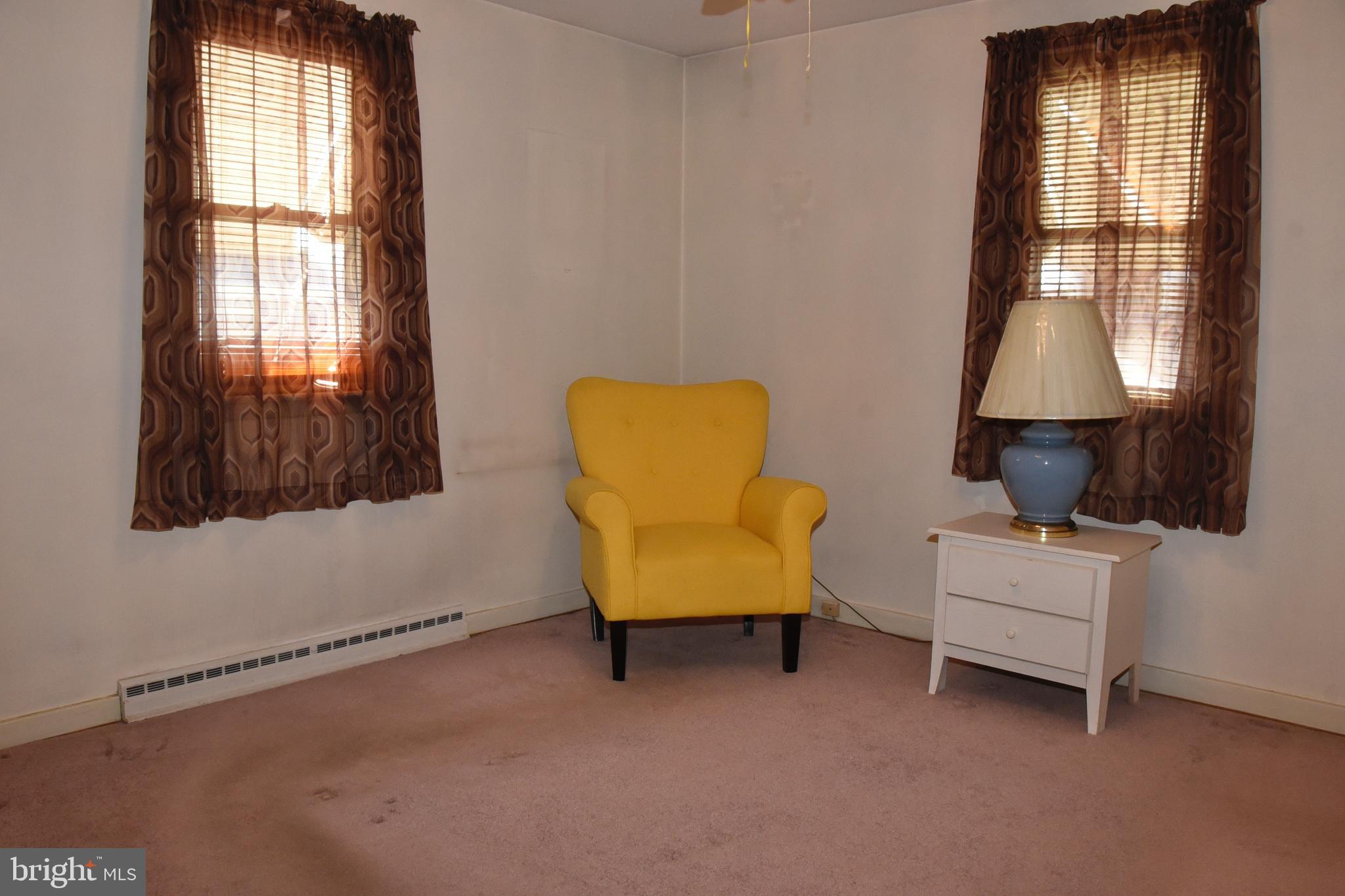 4013 5th Avenue Temple, PA 19560 - Photo 7 of 23 a living room with furniture and a window
