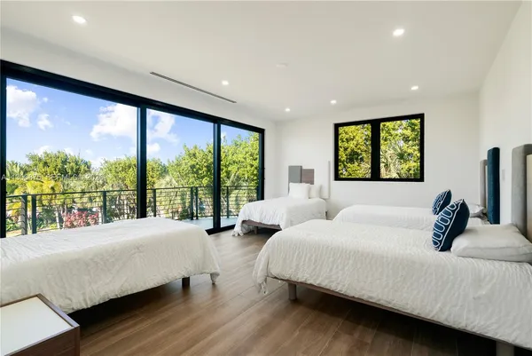 an aerial view of a house with a ocean view