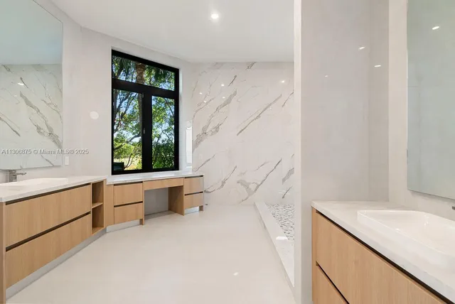 a view of a house with large windows