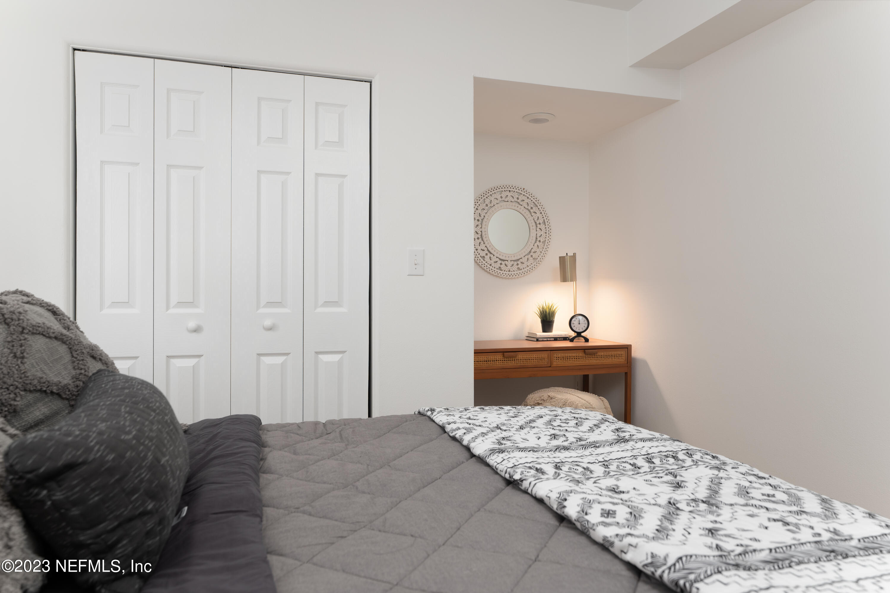 140 Ferrol Road St. Augustine, FL 32084 - Photo 21 of 27 a bedroom with a bed and a dresser