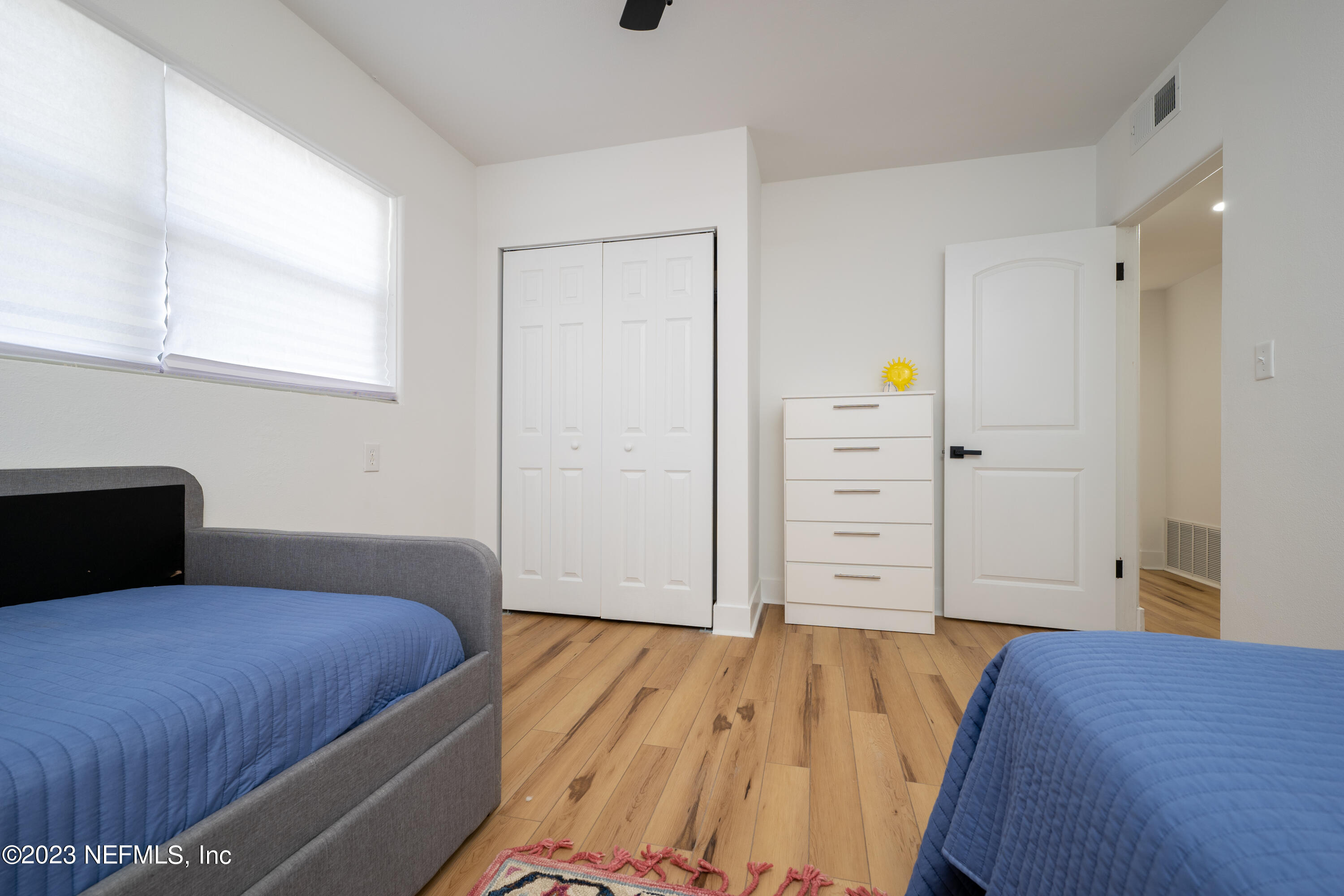 140 Ferrol Road St. Augustine, FL 32084 - Photo 24 of 27 a bedroom with a bed and a window