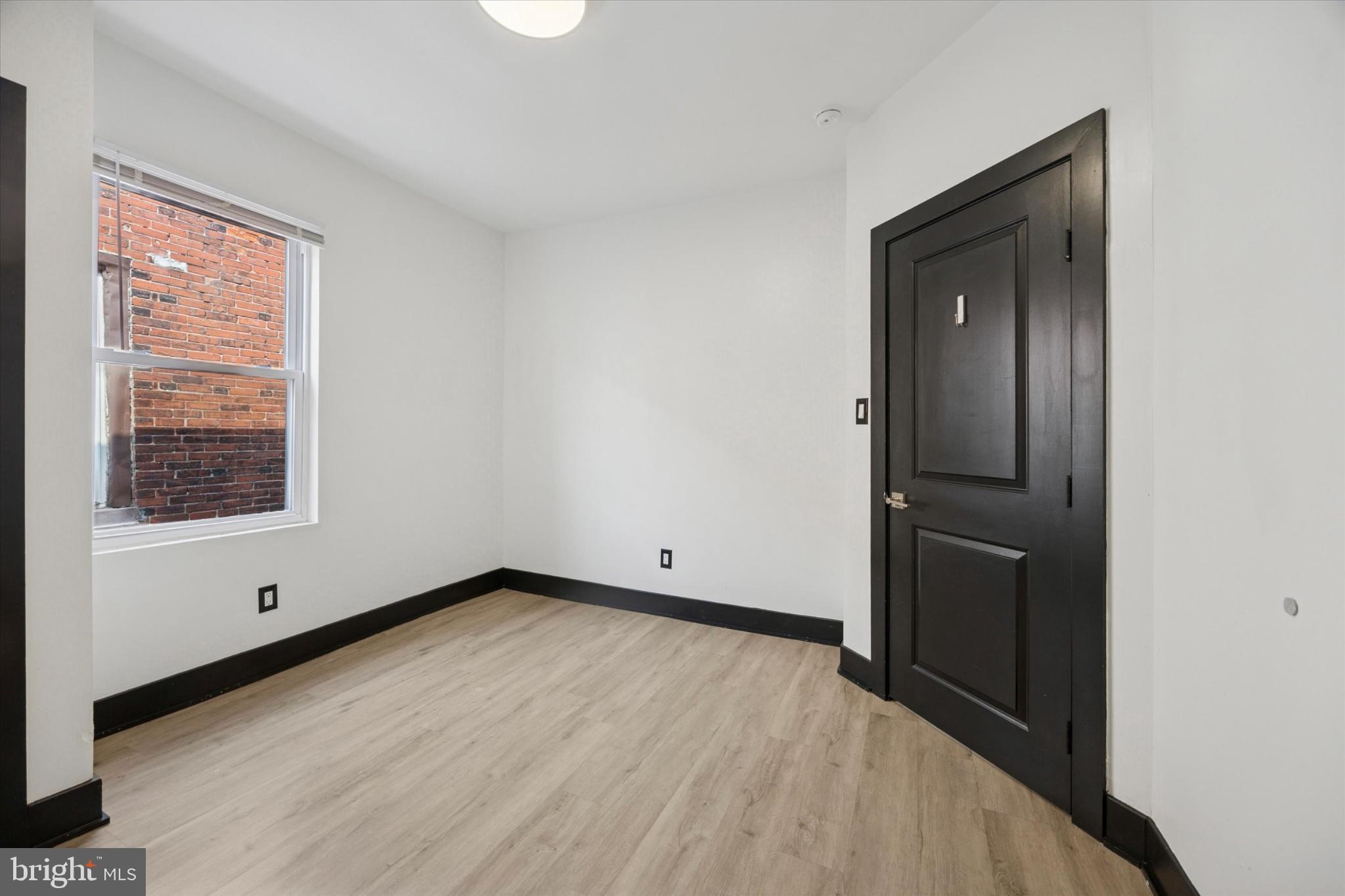 5310 Spruce Street, Unit 2 Philadelphia, PA 19139 - Photo 13 of 19 an empty room with window