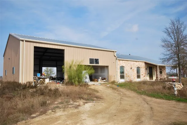 a view of a house with a patio